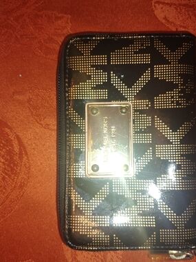 Michael Kors Black and Gold Monogram Patent Wristlet